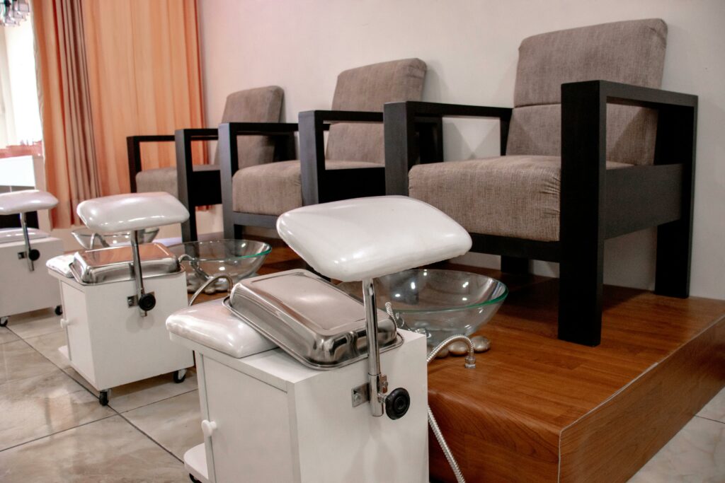 Close-up of pedicure bowls used in Barefoot Toenail Reconstruction Las Vegas, showcasing a clean and inviting setup for nail care treatments